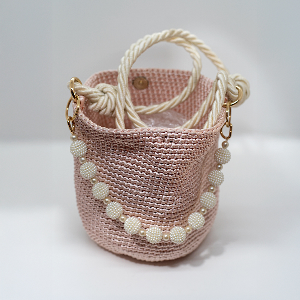 Mochila macramé rosada