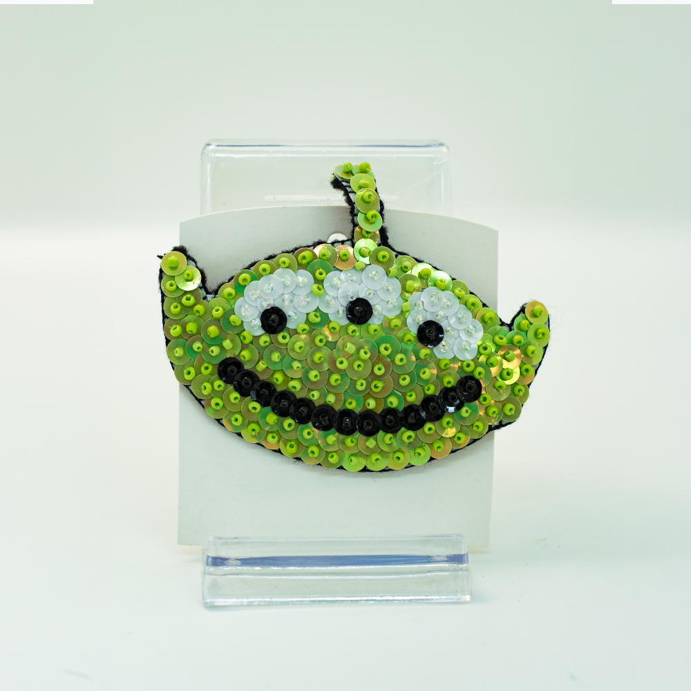 Broche de marciano tres ojos
