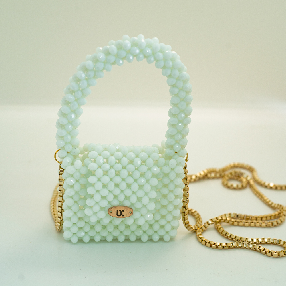 Bolso blanco con dorado