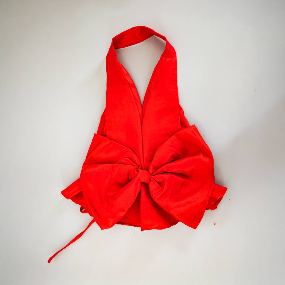 Top sastre rojo