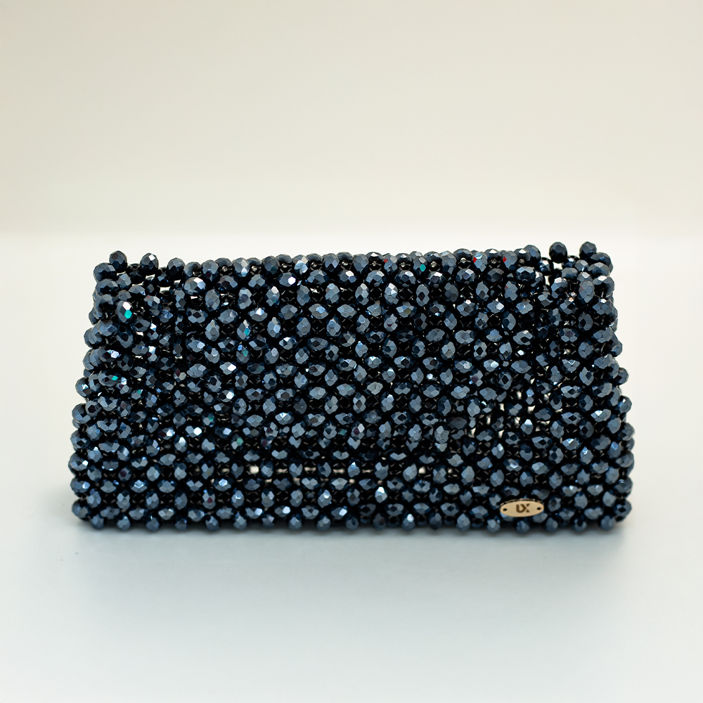 Bolso azulado de perlas